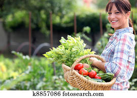 Woman in her vegetable garden Woman in her vegetable garden
