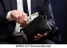 Businessman with money in hands.