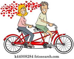 Couple in love riding a bike