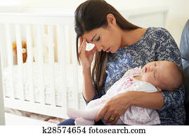 Tired Mother Suffering From Post Natal Depression Tired Mother Suffering From Post Natal Depression