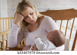 Tired Mother Suffering From Post Natal Depression Tired Mother Suffering From Post Natal Depression