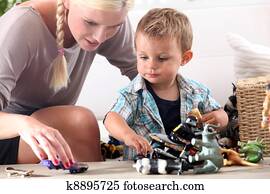 Mother playing with her little boy