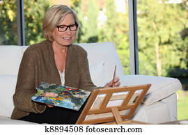 Woman artist at home Woman artist at home