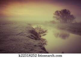 Foggy autumn morning on the river. 