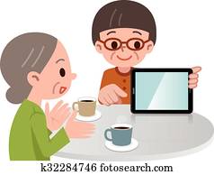 Senior woman described in tablet PC
