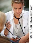 young intern with patient