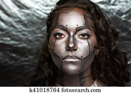 woman with robot face woman with robot face