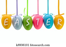 Easter eggs hanging on ribbons. Isolated.