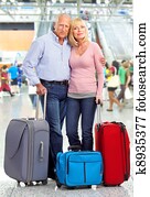 Happy senior couple tourists.