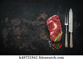 Raw dry aged beef ribeye steak Raw dry aged beef ribeye steak