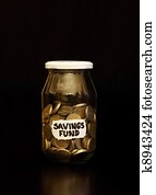 British Pound Coins in Jar