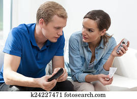 Young couple with financial troubles