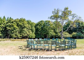 Circle of Chairs in a Park