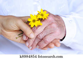 Senior & Young Ladies Holding Hands