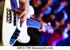 Young guitar player performing in night club Young guitar player performing in night club