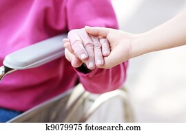 Senior Lady in Wheelchair Holding Hands Senior Lady in Wheelchair Holding Hands