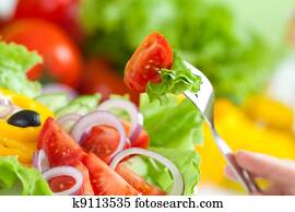healthy food fresh vegetable salad and fork