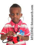Black African American child with stethoscope and car