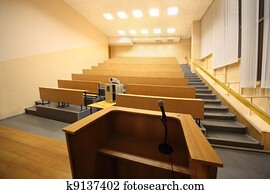 Large classroom, university lecture hall; view from lectern with microphone Large classroom, university lecture hall; view from lectern with microphone