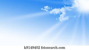 blue sky during a sunny day with sunlight. sun somes clouds, free space for text