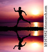 young runner with water reflecting