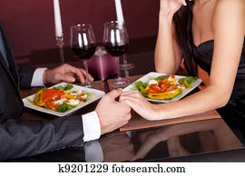 Couple at romantic dinner in restaurant