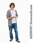 estudante masculino, posar, enquanto, segurando, um, almofada toque