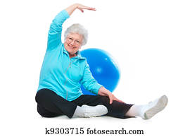 senior woman doing stretching exercises senior woman doing stretching exercises
