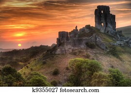 Castle ruins landscape with bright vibrant sunrise
