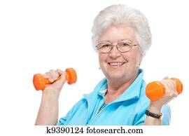 Attractive senior woman at health club