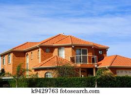 House with terracotta roof tiles House with terracotta roof tiles