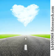 road and cloudy heart in sky