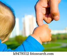 hands of child son and father hands of child son and father