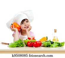 Chef girl preparing healthy food vegetable salad over white background