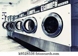 Laundromat Stock Images | Our Top 1000+ Laundromat Photos | Fotosearch