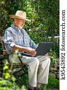 Senior with a laptop