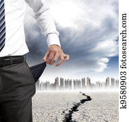 business man showing his empty pockets and financial crisis concept