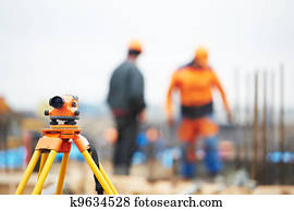 surveyor equipment level at construction site