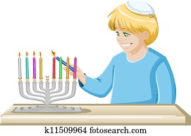 A Boy Lights A Hanukkiah Candle A Boy Lights A Hanukkiah Candle