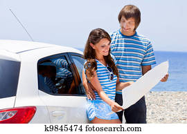 A couple is going on a car trip