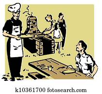 A family enjoying a picnic barbeque