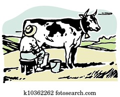 A man milking a cow in a field A man milking a cow in a field
