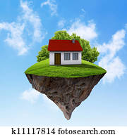 A piece of land in the air with house and tree. A piece of land in the air with house and tree.