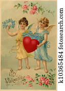 A vintage Valentine postcard with two angels holding a heart and forget-me-not flowers A vintage Valentine postcard with two angels holding a heart and forget-me-not flowers