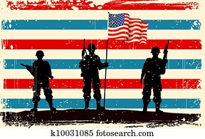American soldier standing with American flag American soldier standing with American flag