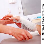 Bandaging patient in hospital.