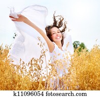 Beautiful Happy Girl on the Wheat Field Beautiful Happy Girl on the Wheat Field