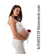 Beautiful pregnant brunette lady on white background