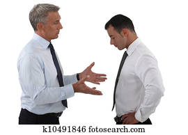 Boss and employee having a serious discussion Boss and employee having a serious discussion