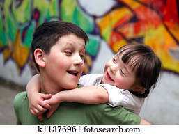 Boy and girl together on the playground. Boy and girl together on the playground.